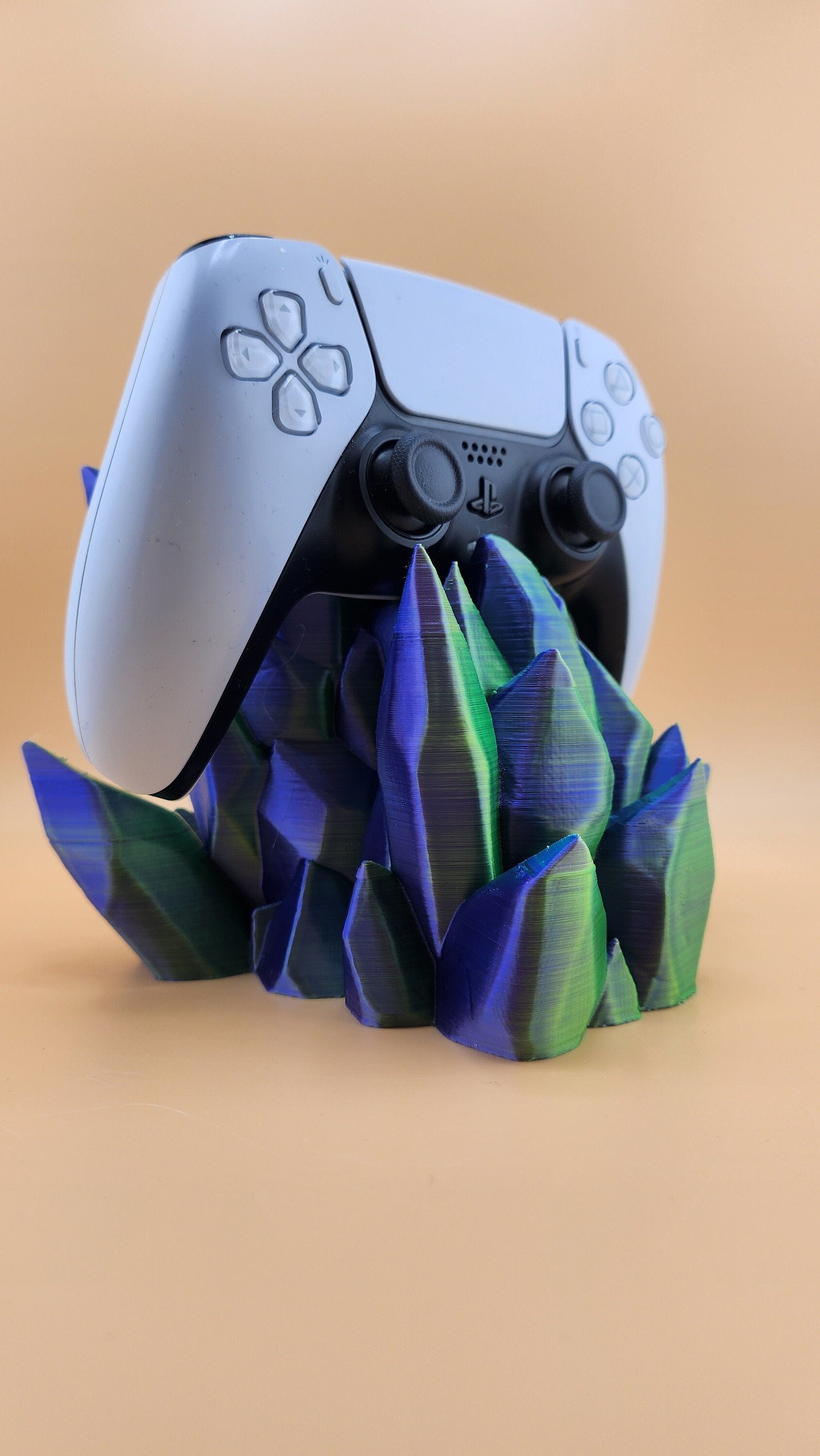 The Crystal Controller holder holds any PlayStation and Xbox controller!