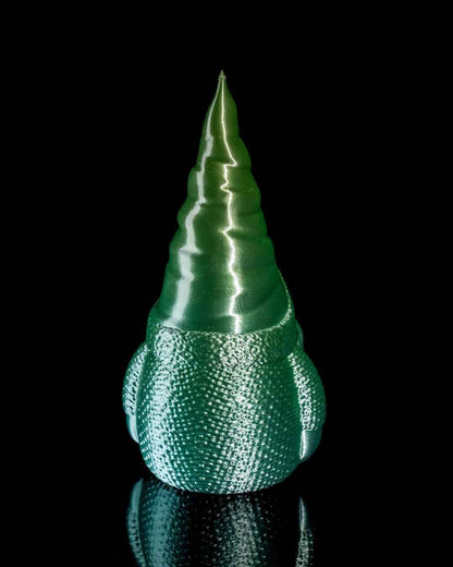 Rear profile of a shiny emerald green gnome highlighting the textured knit body and the tall, pointed spiral cap.