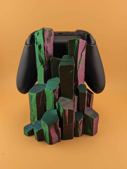 Controller grips visible behind the stand of towering crystal rock structures in highly iridescent green and magenta.