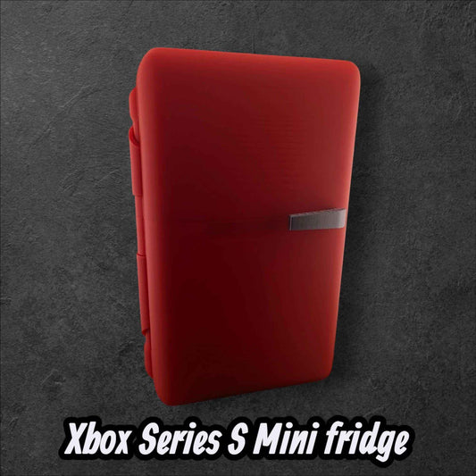 Matte red console-shaped storage unit, resembling an Xbox Series S Mini fridge, shown in an upright profile.