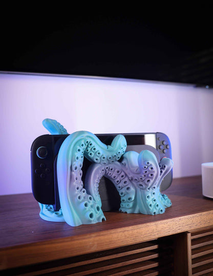 Close up profile of the matte blue/purple kraken stand wrapping intricately around the black console.